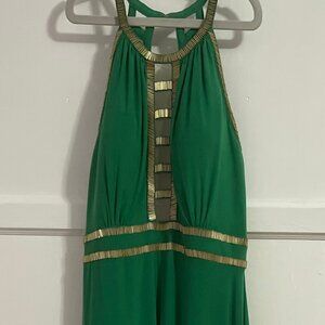 Emerald green dress, gold colored straps for shoulders and mesh.